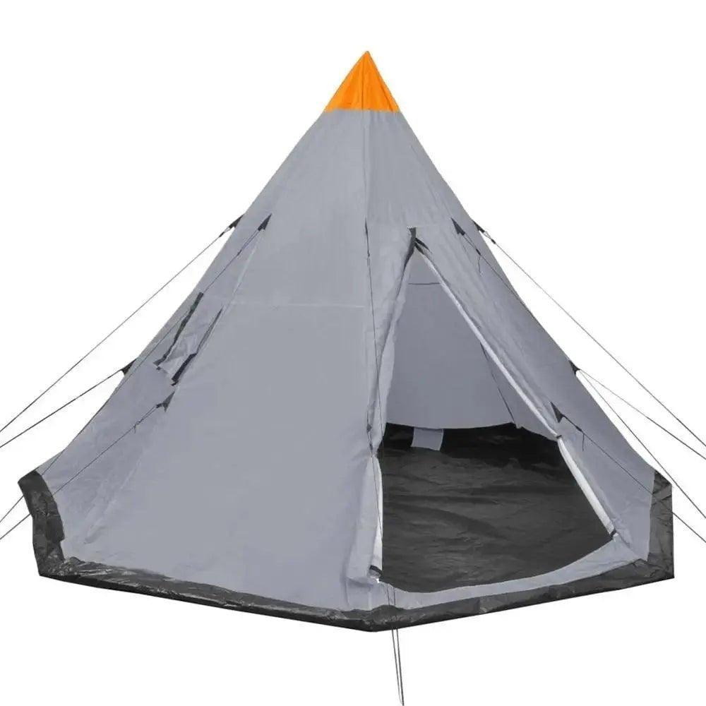 A close-up of a tent for four people camping outdoors with bag.